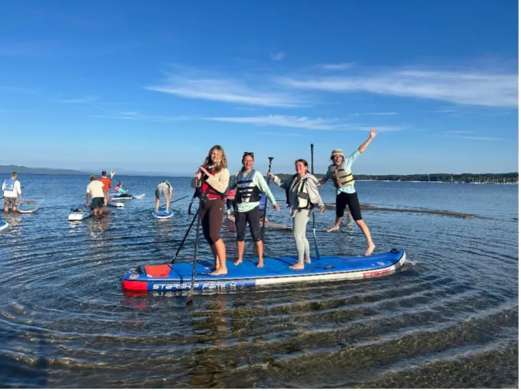 Sustainable Innovation MBA SI-MBA students paddleboarding
