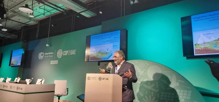 Man standing at a lecturn