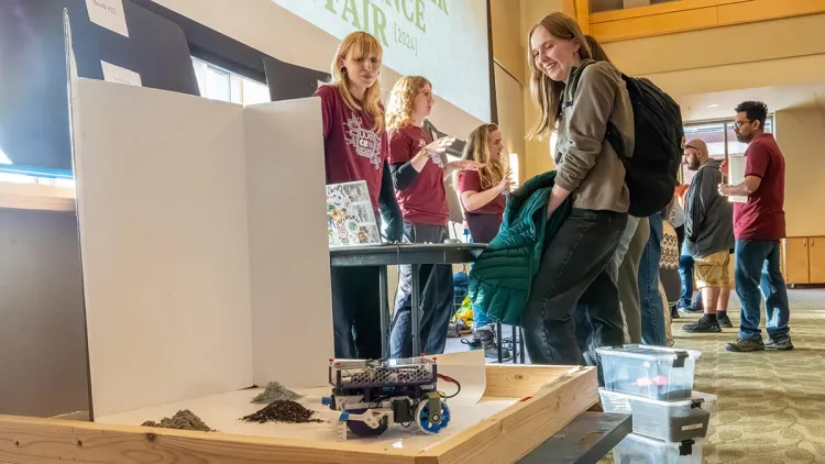 Students share their project with computer science fair attendees
