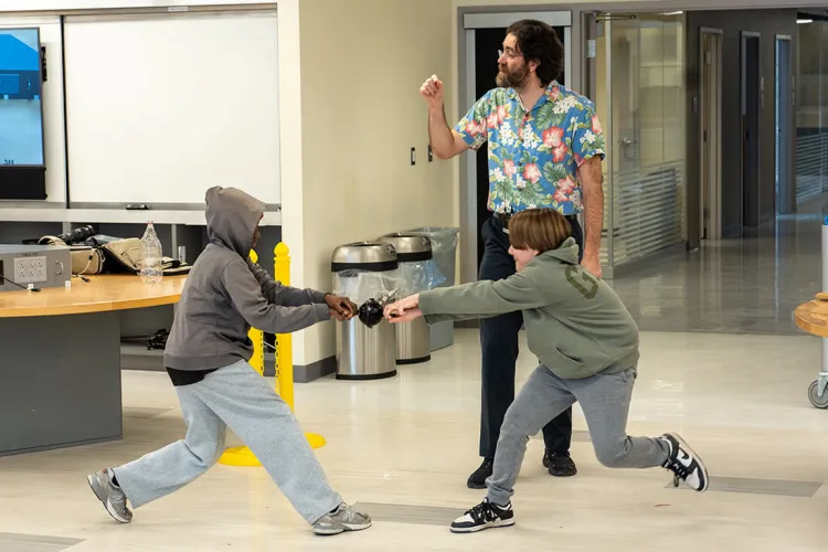 A physics professor recruits middle-school children for a demonstration