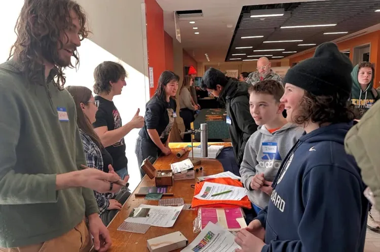 SPS tabling with electricity and magnetism demos in Innovation.