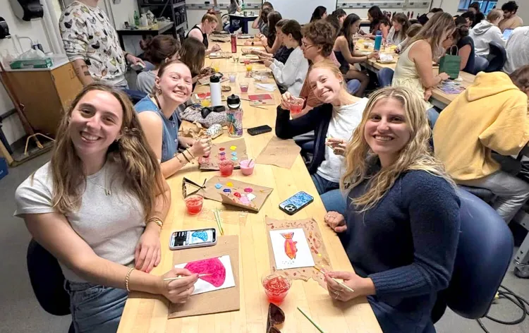  Members of BMES enjoying the Paint n' Sip event