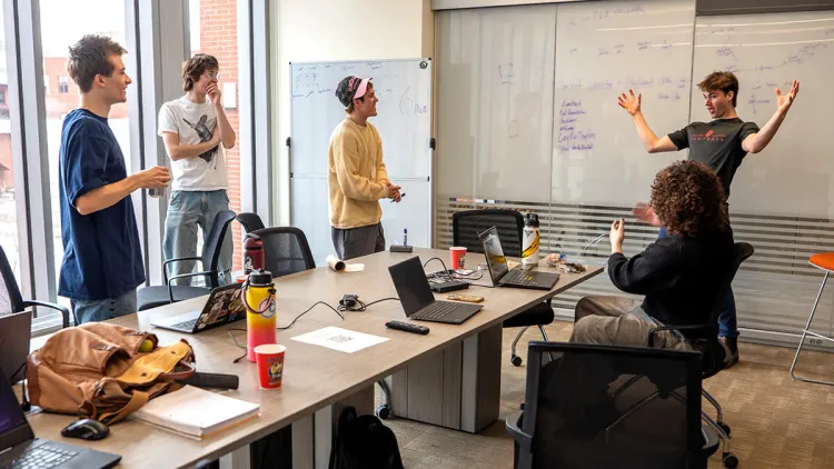 Students collaborate on their project during the 2026 Hackathon