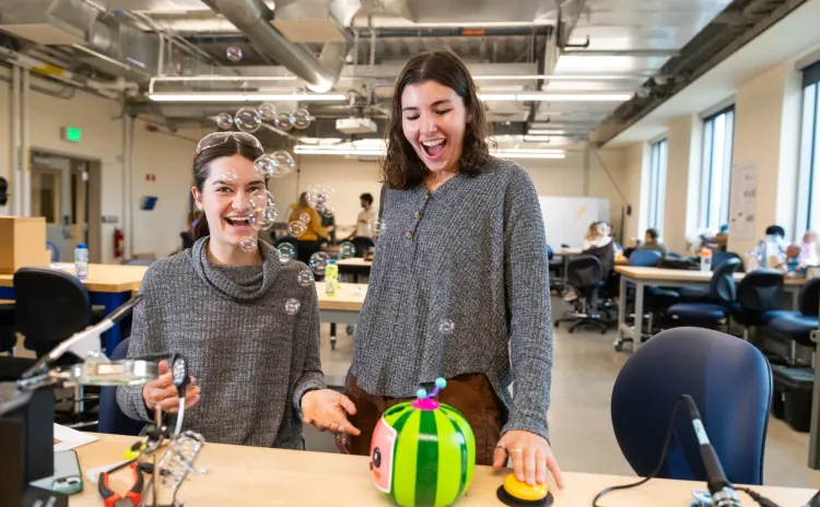 In the biomedical engineering lab, occupational therapy students modify a toy’s on/off switch to make it more accessible for children with diverse needs.