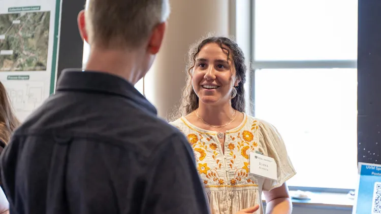 A CEMS student shares their projects during 2026 Design Night