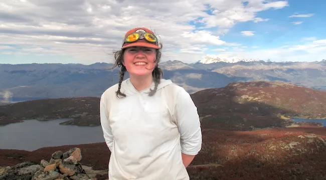 portrait of a woman on a mountaintop
