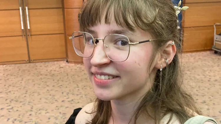 Close-up of a smiling person.