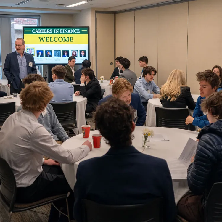 Jamie Flicker engages with students during networking event