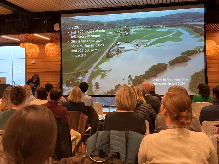Woman presenting to crowd