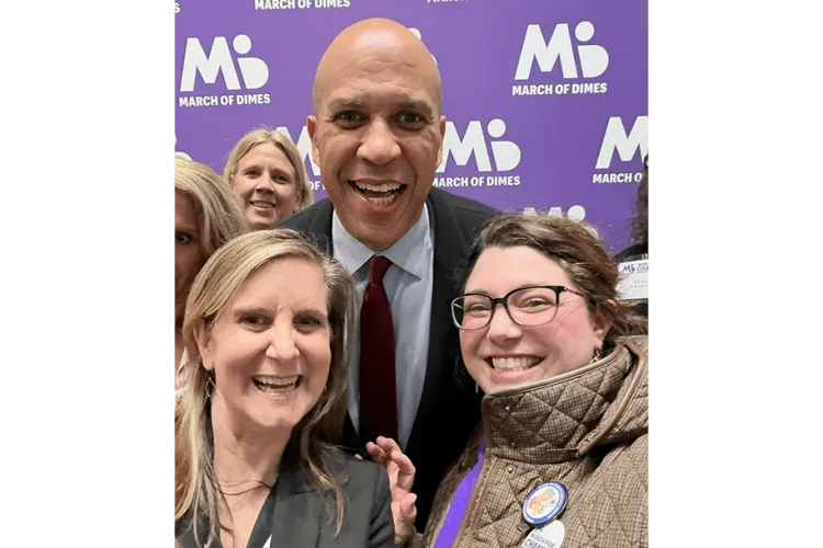 Three individual smiling. 