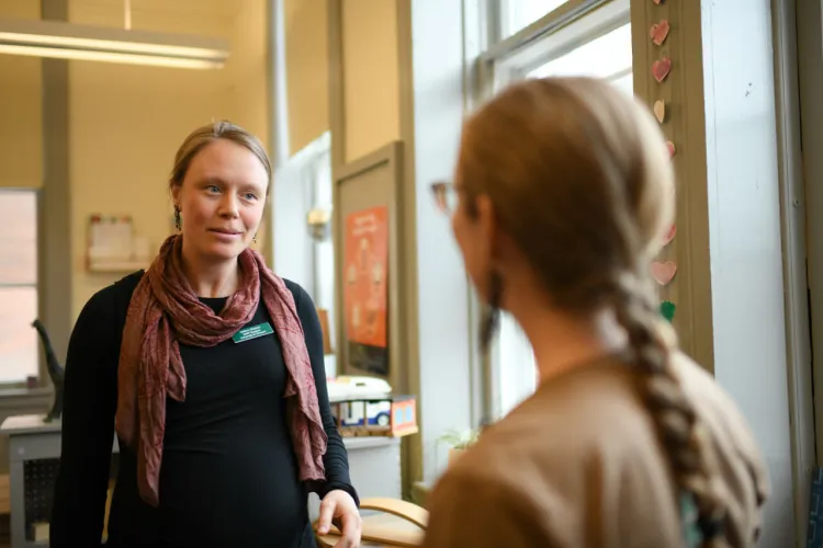 Two school nurses having a conversation