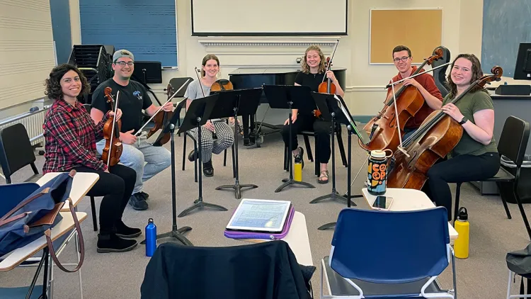 Alli Cooper-Ellis with the UVM Philharmonic Club, a student-led string orchestra.