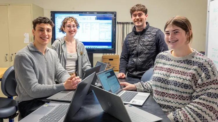 Adam Slamani, Aria Lindberg, Ryan Anderson, and Kendyll Bache collaborate on their senior capstone SEED project, "Bidirectional and Half Bridge GaN Layout And Device Design."