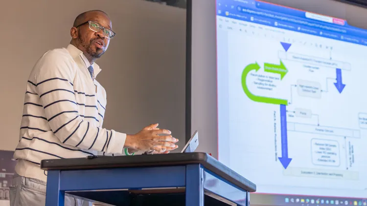 A graduate student presents his project proposal in the Center for Biomedical Innovation