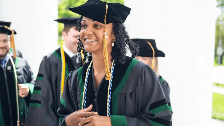 a group of people wearing academic regalia