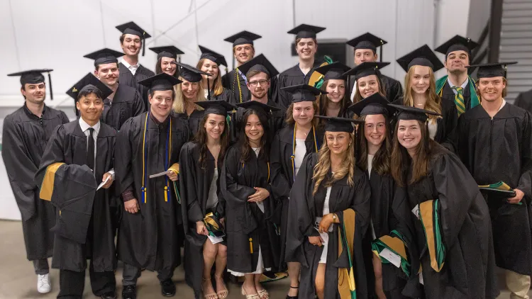 Master of Accountancy MAcc Graduates pose at commencement 2026 at UVM for the Grossman School of Business