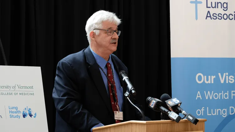 a person standing at a podium