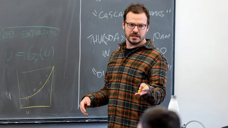 Laurent Hébert-Dufresne teaching a class at UVM