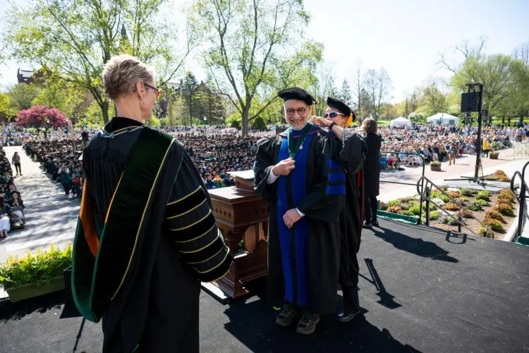 Professor Paul Bierman received an award at UVM Commencement 2026