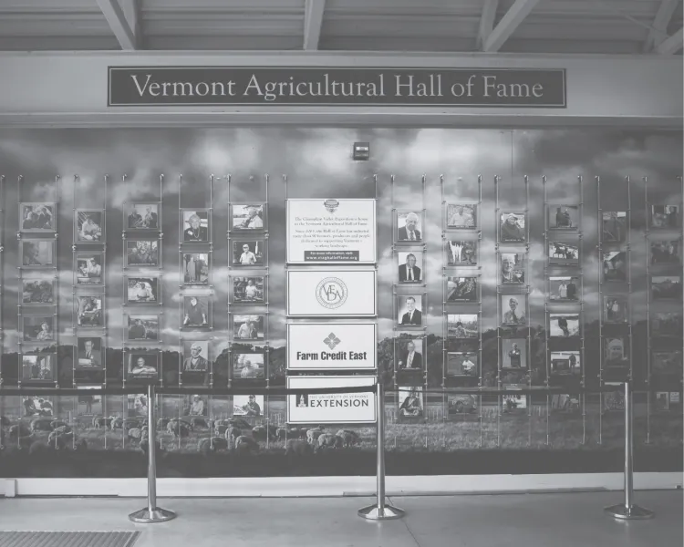 A room with photographs and a banner reading Vermont Agricultural Hall of Fame
