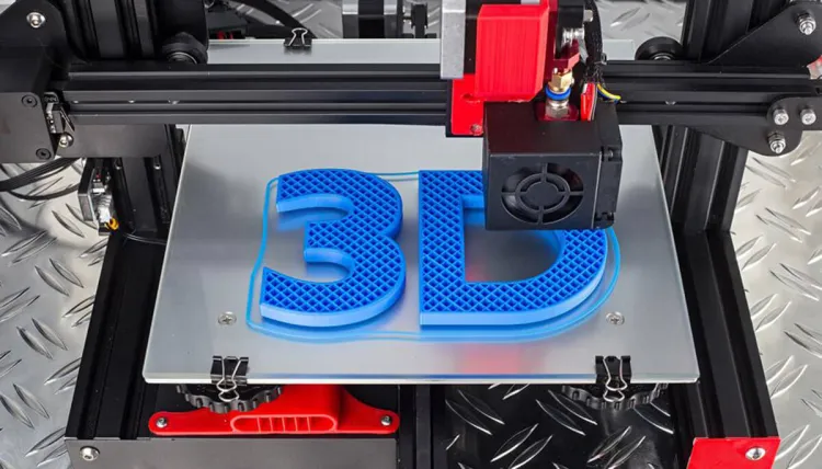 A 3D printer printing the letters 3D