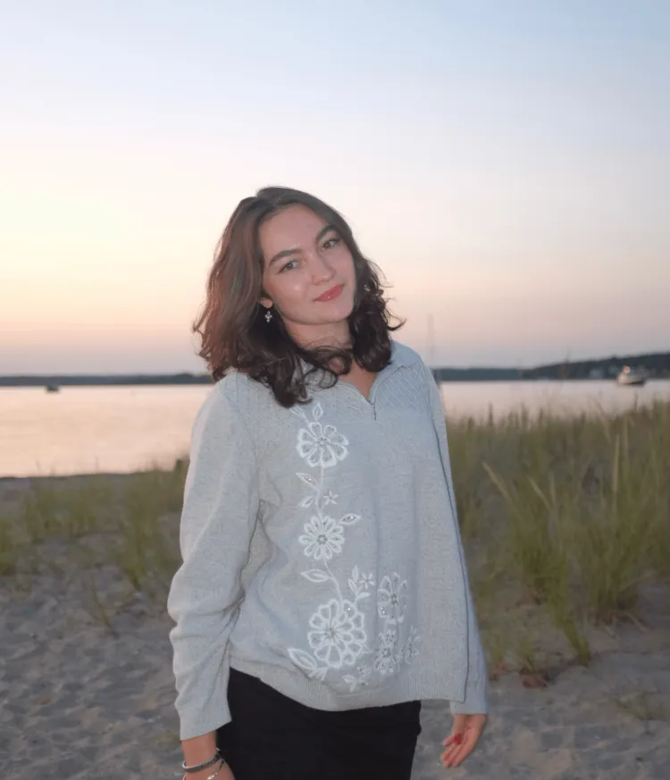 Young woman standing on a beach