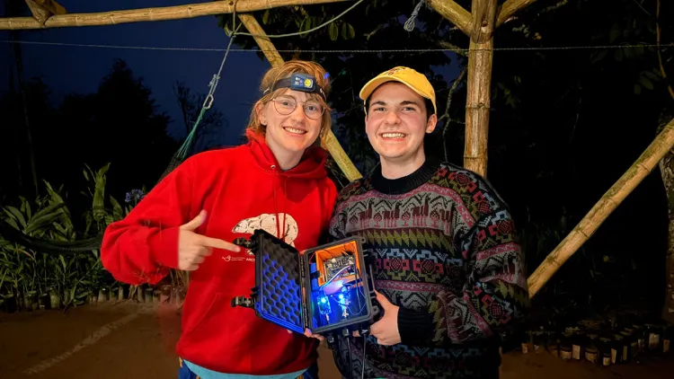 Ginger Thralow and Finn Duncan share the electronics behind the water monitoring station prototype.