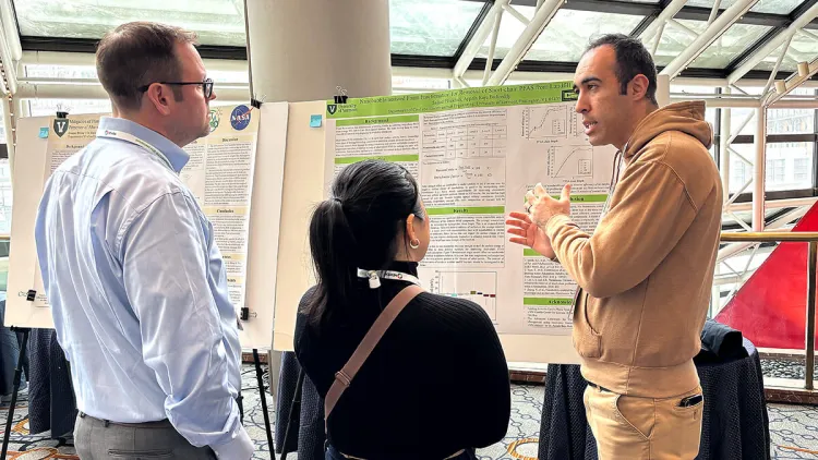 Sajjad Eftekhari shares his award-winning research poster with colleagues at the NEWEA Conference this past Spring