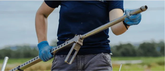 soil probe in hand