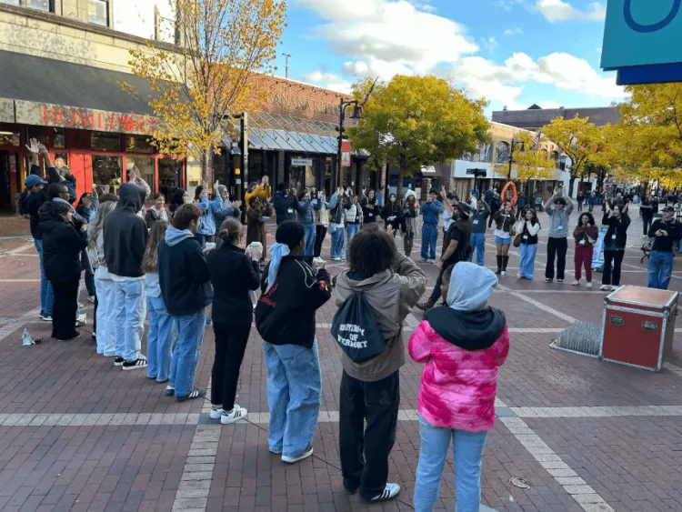 A group gathers on Church St