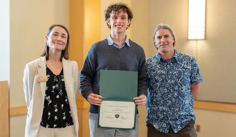 CEE student Garrett Webster receiving an award 