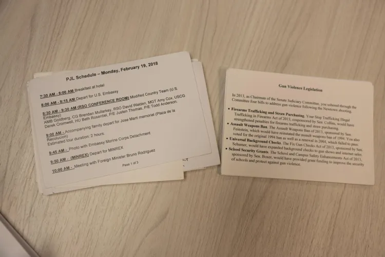 Note cards on a table detail Leahy's schedule by the hour for February 19, 2018. The note cards also detail notes on Leahy's gun violence legislation history.