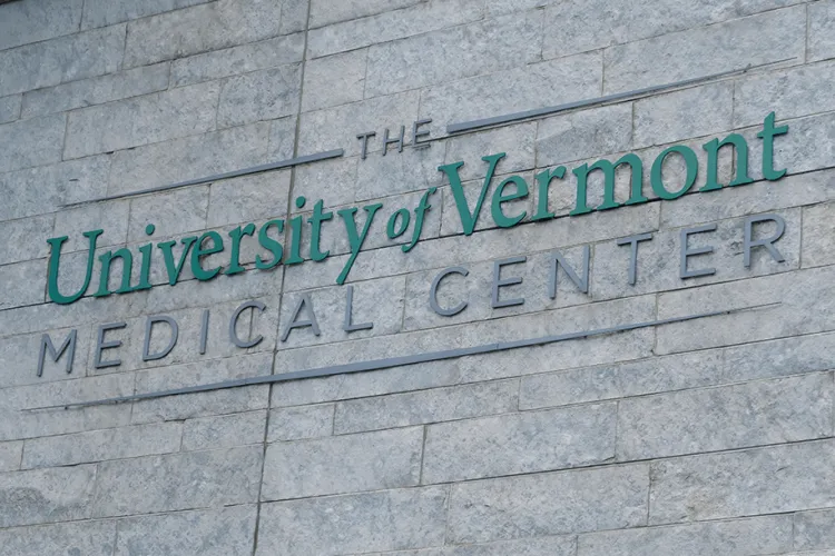 UVM Medical Center Logo on a brick wall. 