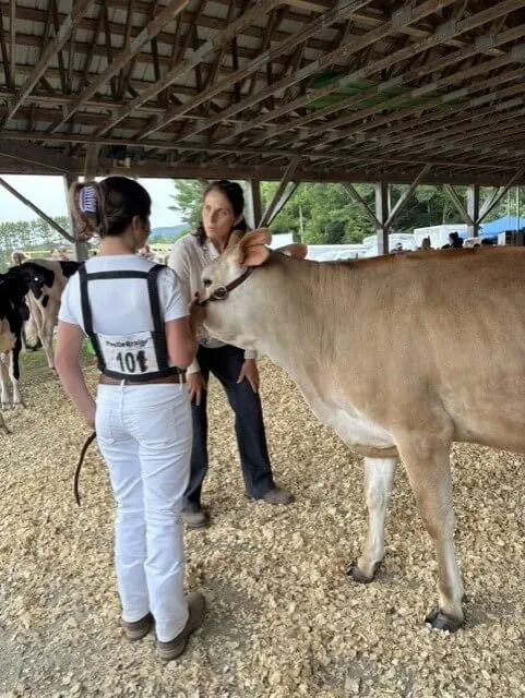 Girl with a judge at the fair