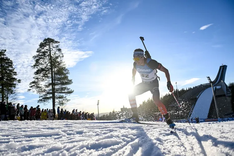 biathlete crosses the snow on skis