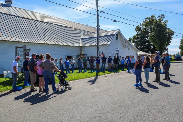 Farm tour guests in a circle