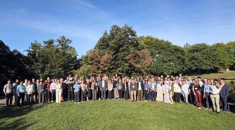 a large group of people standing outdoors