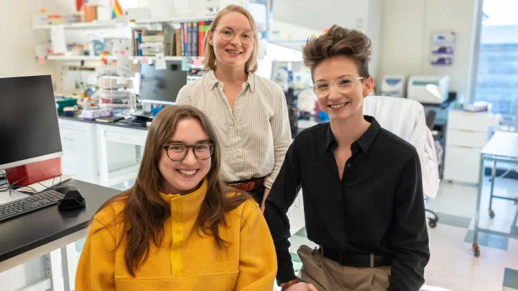 Phd students Audrey Clay-Streib and Libby Murphy with Professor Kaitlin McCreery in the Multiscale Bioengineering Lab.