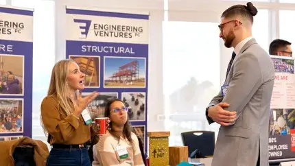 A student and tech company representative meet during a career fair