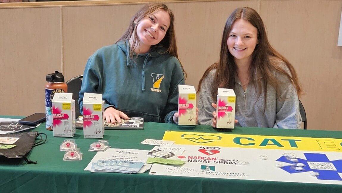 Cat ECare interns hand out free harm reduction resources and information in the Davis Center