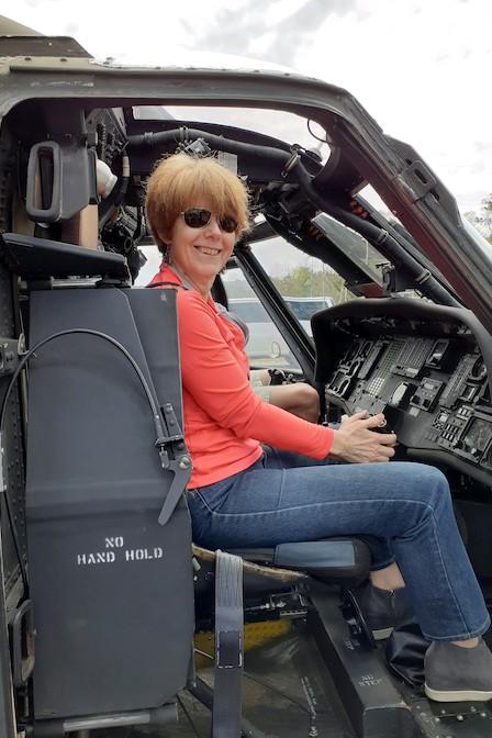 Celia Rainville sitting in an airplane cockpit