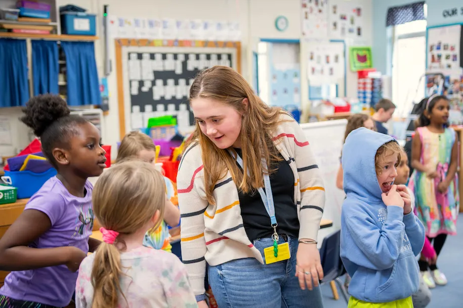 Sarah Bassett with students at Orchard Elementary School