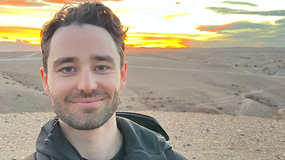Smiling and enjoying a beautiful sunset