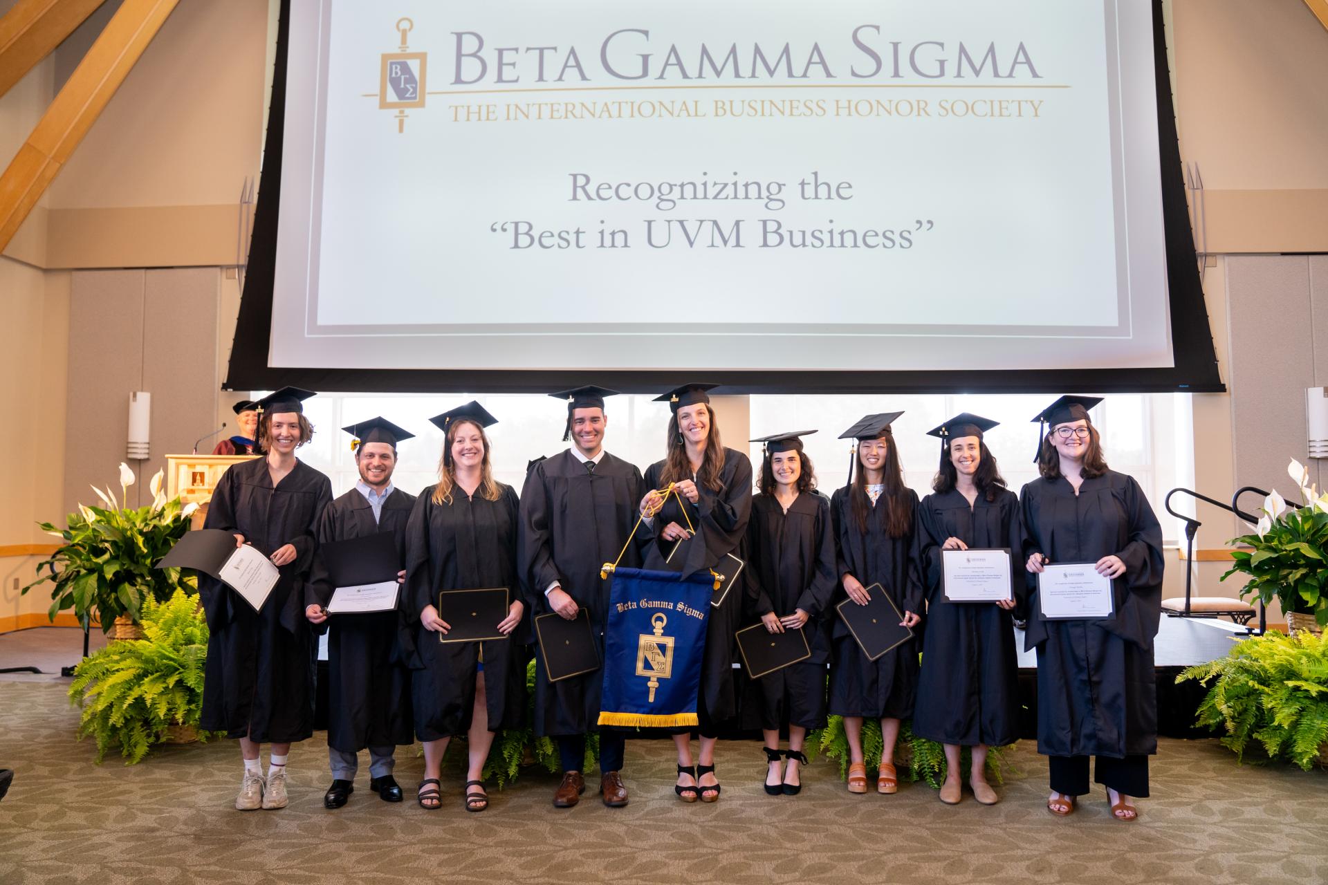 New members of the Beta Gamma Sigma honor society pose during the Sustainable Innovation MBA Inauguration