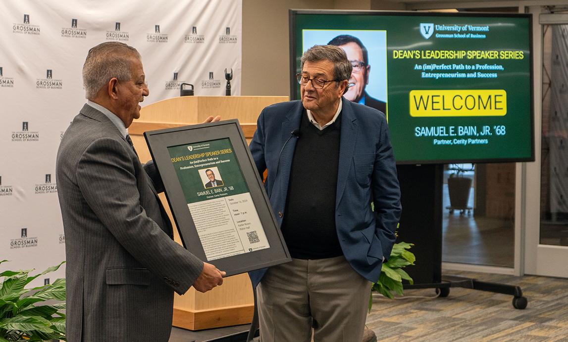 Dean Sanjay Sharma presents a gift to Samuel E. Bain, Jr.