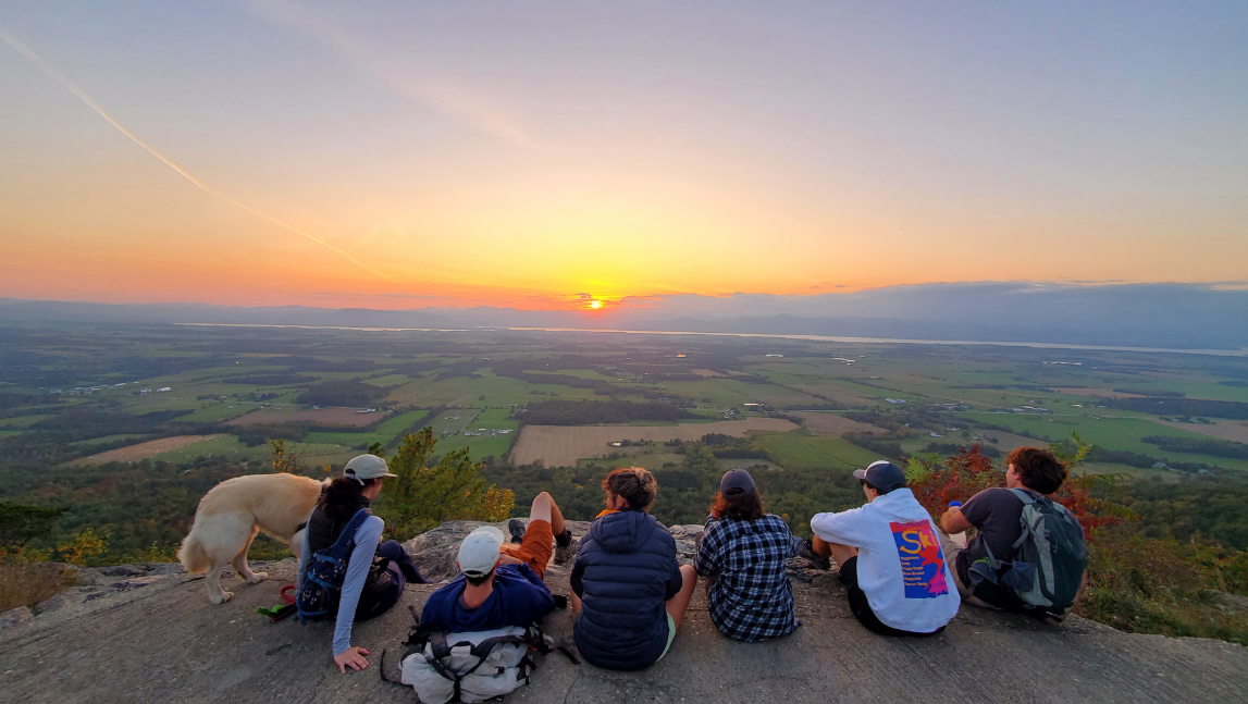 Sustainable Innovation MBA students enjoy a sunset.
