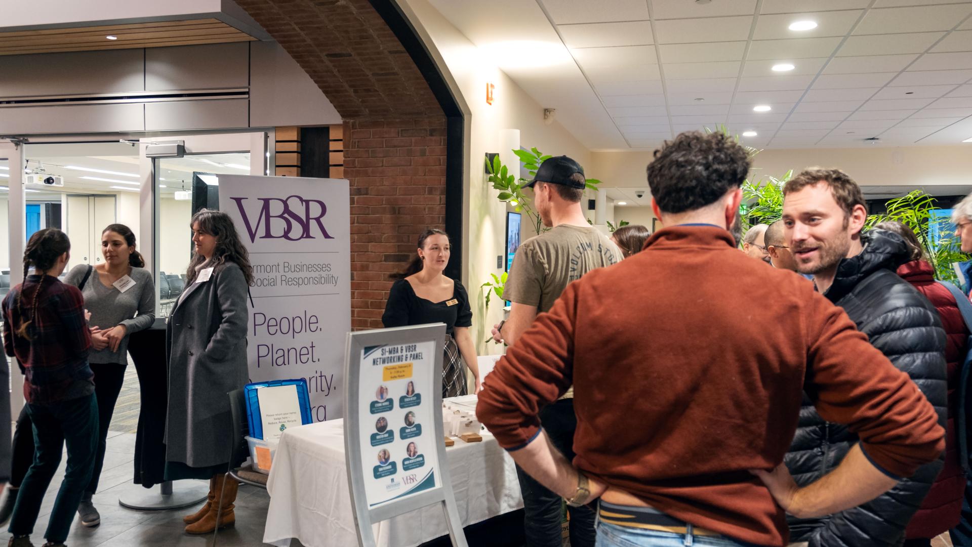 Students network at the Vermont Businesses for Social Responsibility conference.