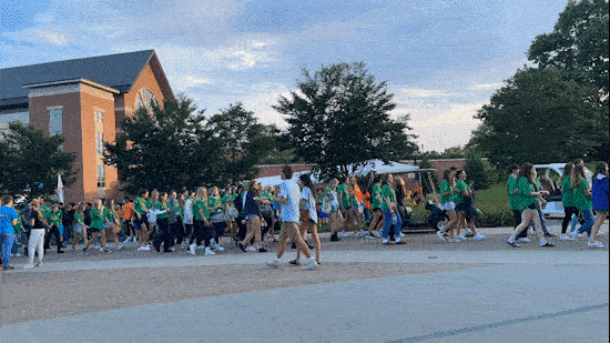 Timelapse of students proceeding in a line to the Green from Convocation