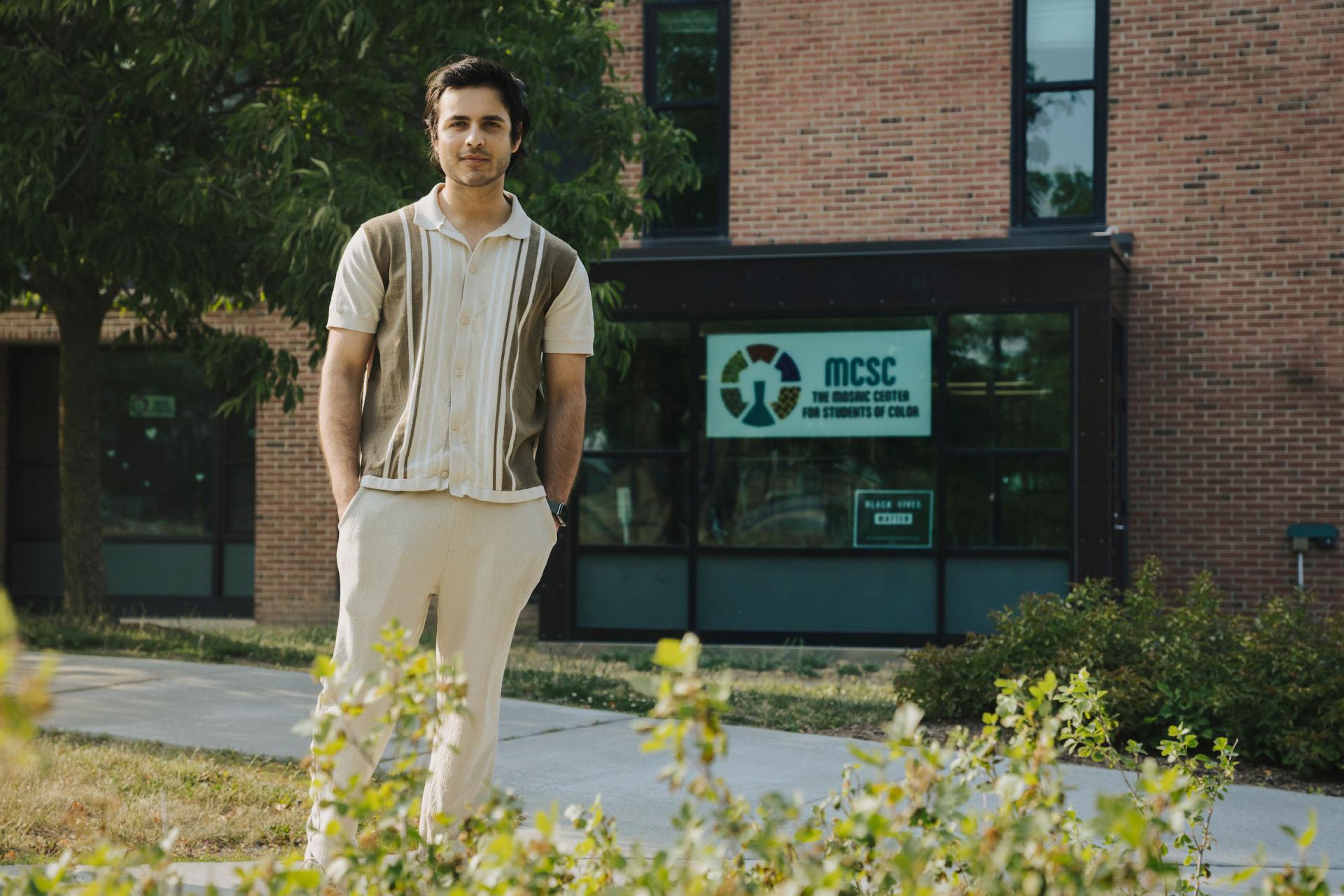 Perin Patel stands outside UVM's Mosaic Center for Students of Color