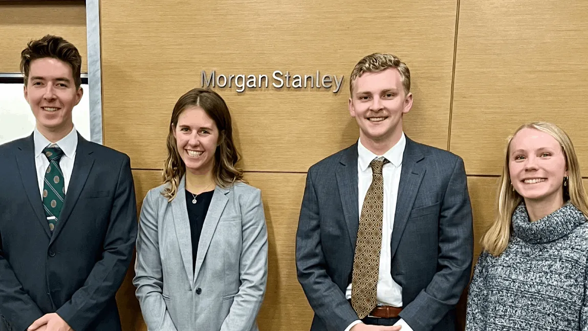 GSB Students stand in front of Morgan Stanley sign